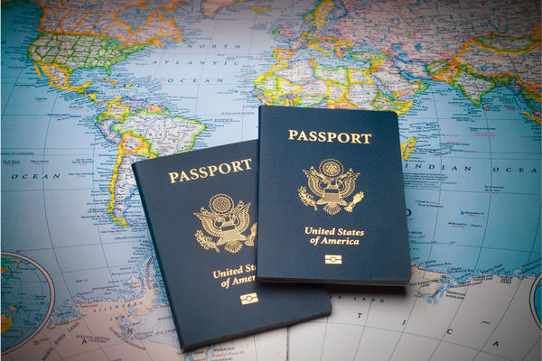 Travel passports on a world map ready for any exotic destination
